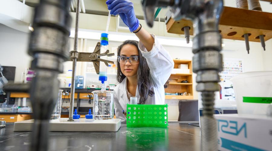 Diana Argiles Castillo doing lab work